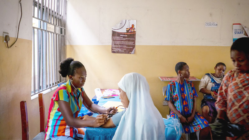 Doctor treating people - Nigeria