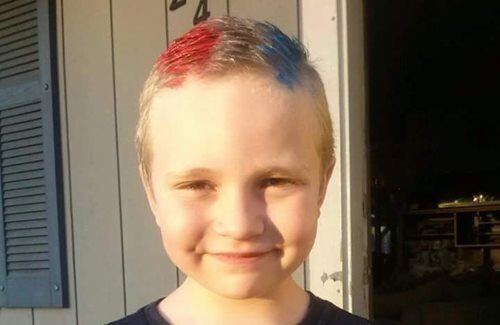 A photograph of Boyd Steel Rogers standing outdoors