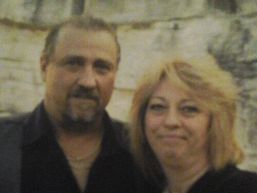 A photograph of Carrie Tozak and another person