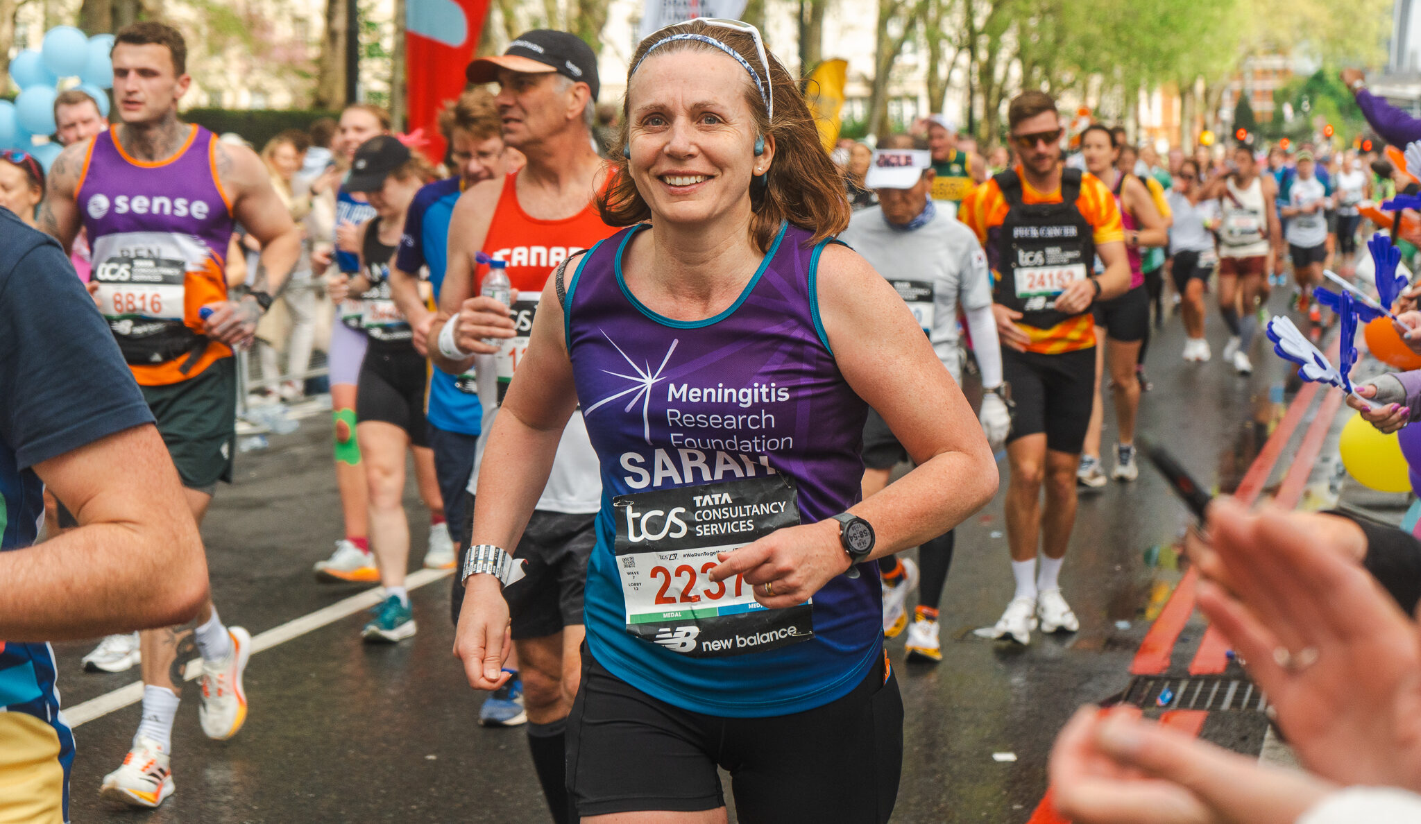 London Marathon runner smiling for the camera
