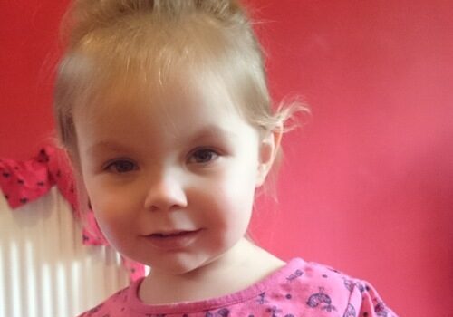 A photograph of Daisy Mitchell as a toddler