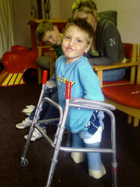 An image of Edward Bright using a walking frame