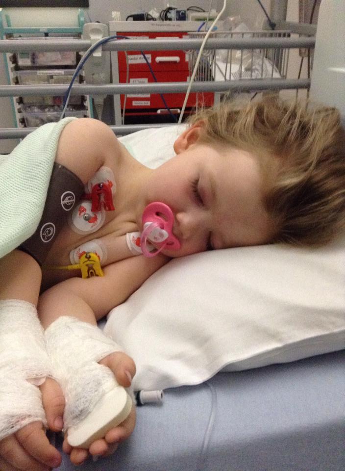 A photograph of Eloise Carter in a hospital bed