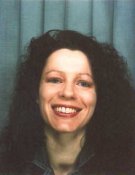 A passport photograph of Kate Tucker smiling