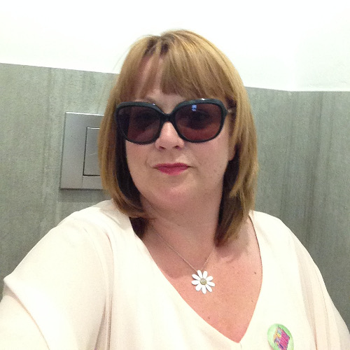 A photograph of Jennifer Gray wearing sunglasses