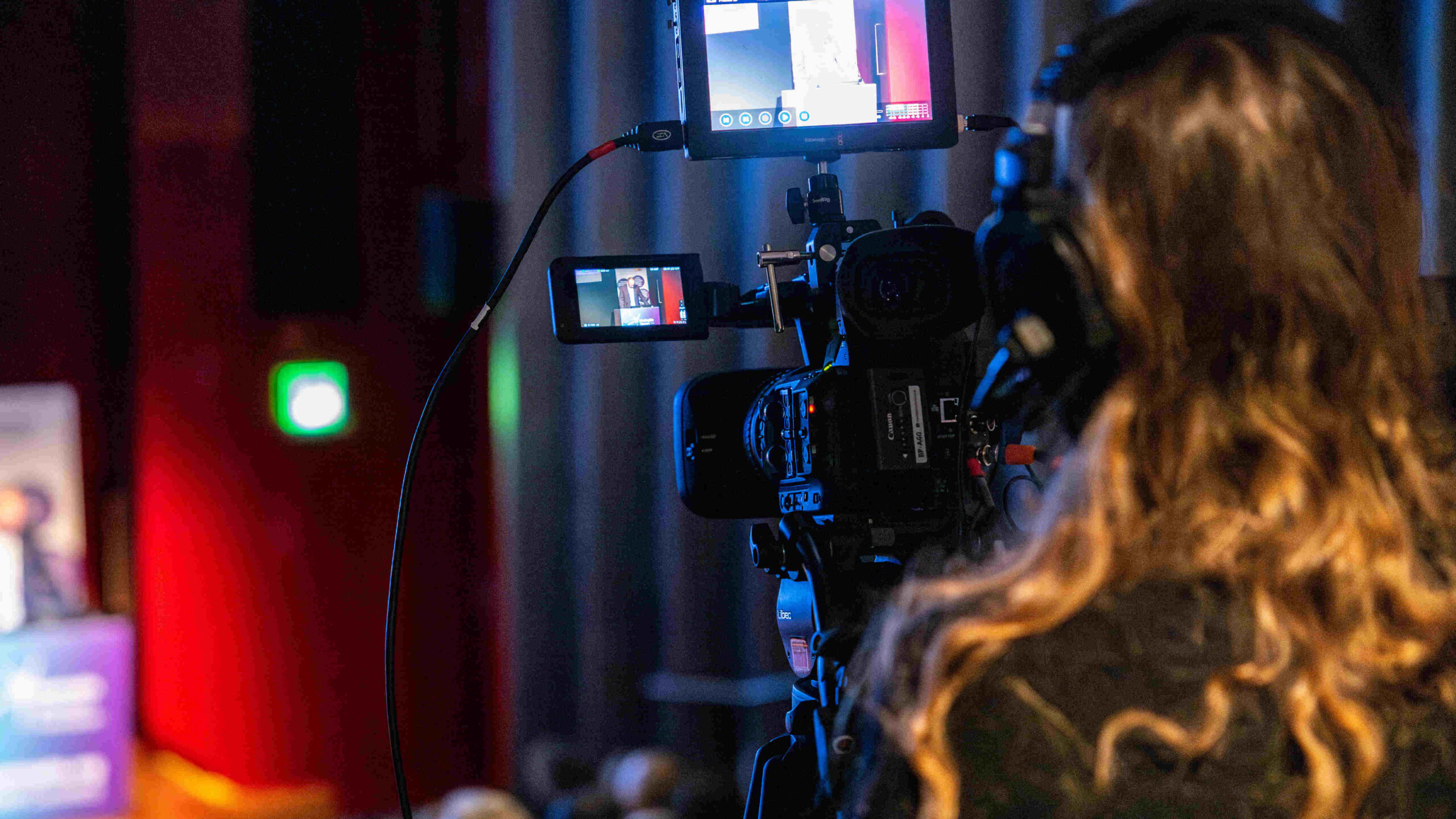 Videographer recording the MRF Conference 2023.