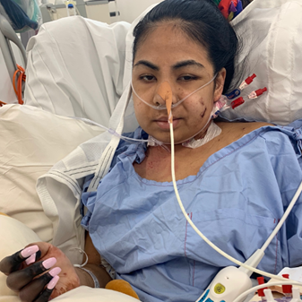 Juttima Chinnasri after waking up from her coma in 2018