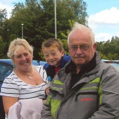 A photograph of Ruth's parents with her son.