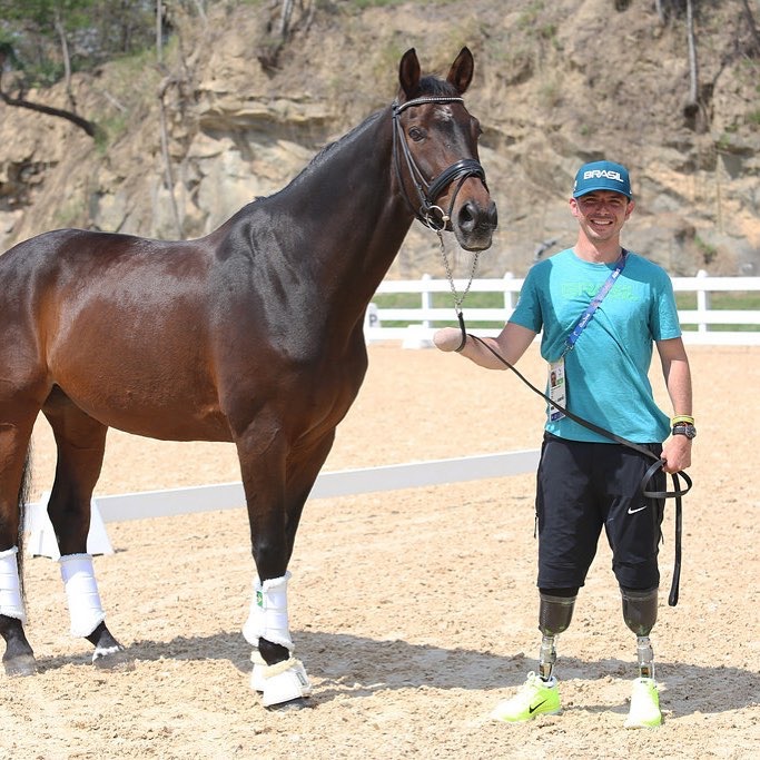 Rodolpho Riskalla stood next to a horse