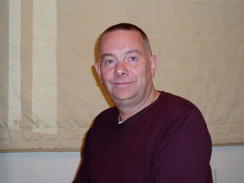 A photograph of Simon Robertson