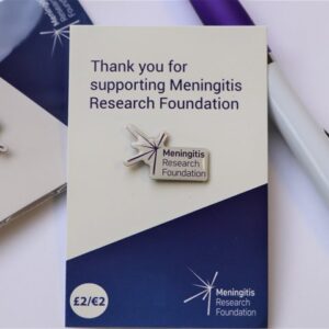 MRF logo pin badge, on branded backing card