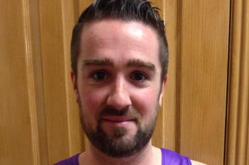 A photograph of Stephen Douglas in a running vest