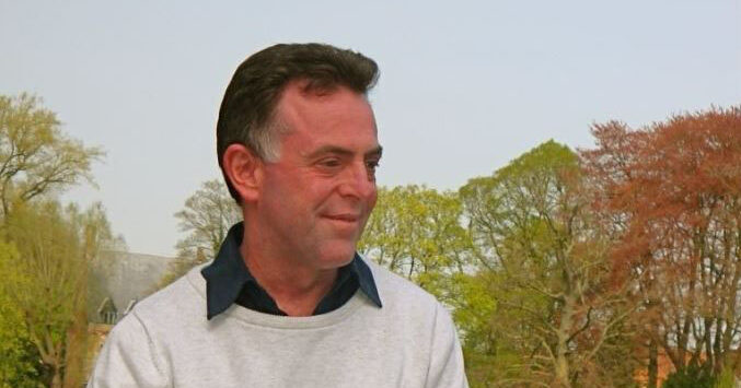 A photograph of John Spalding outdoors