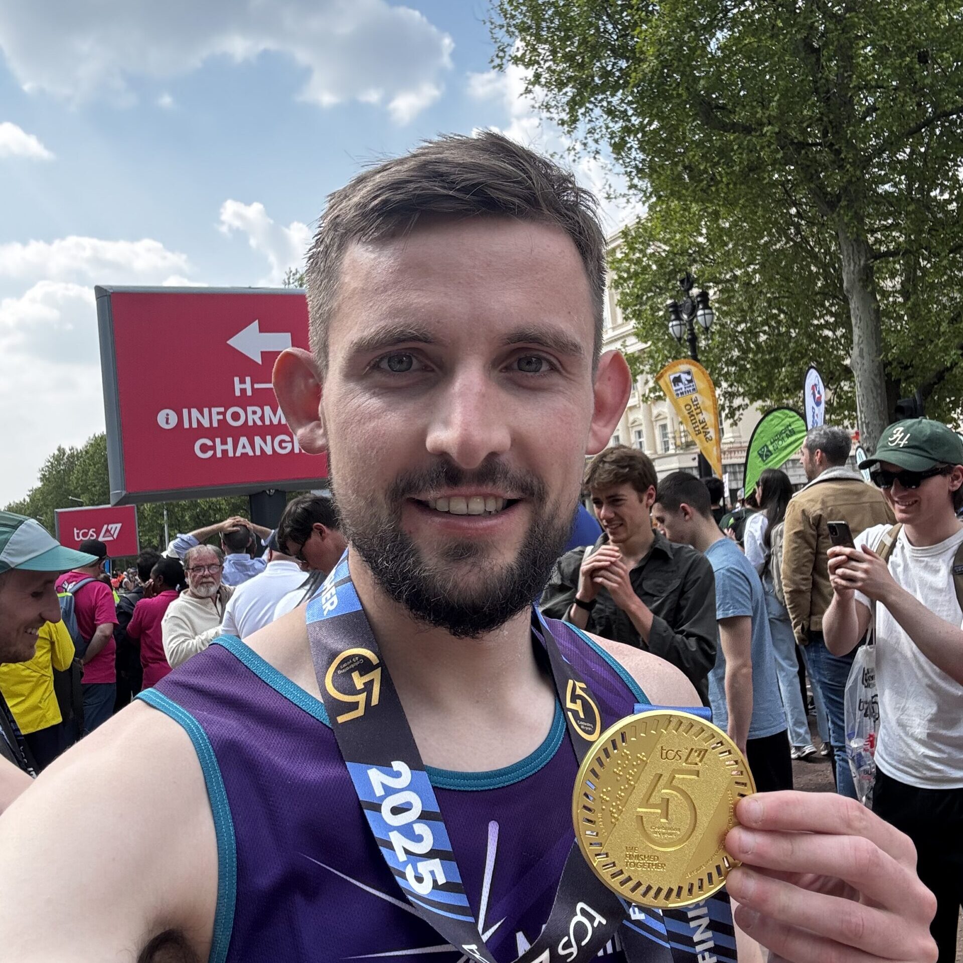 Drew at the finish line with his medal