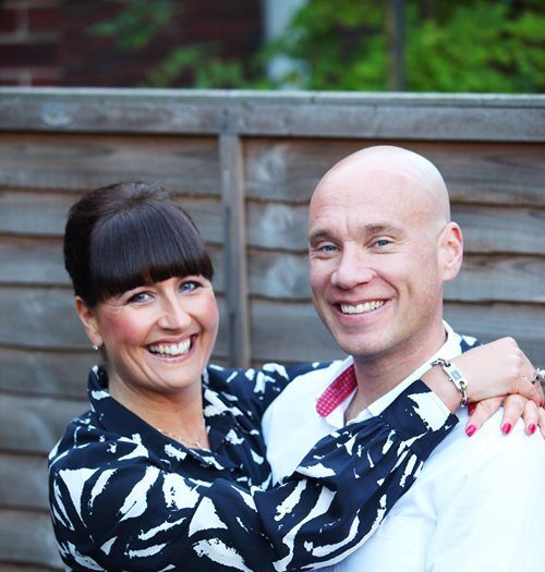 A photograph of Zoe Clayton and her partner Dan.