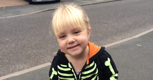 Lucy Cummings wearing a skeleton onesie