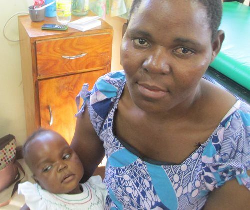 A photograph of Evelyn Julias holding baby Ruth