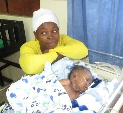 A photograph of Sherifa and her mother in the hospital