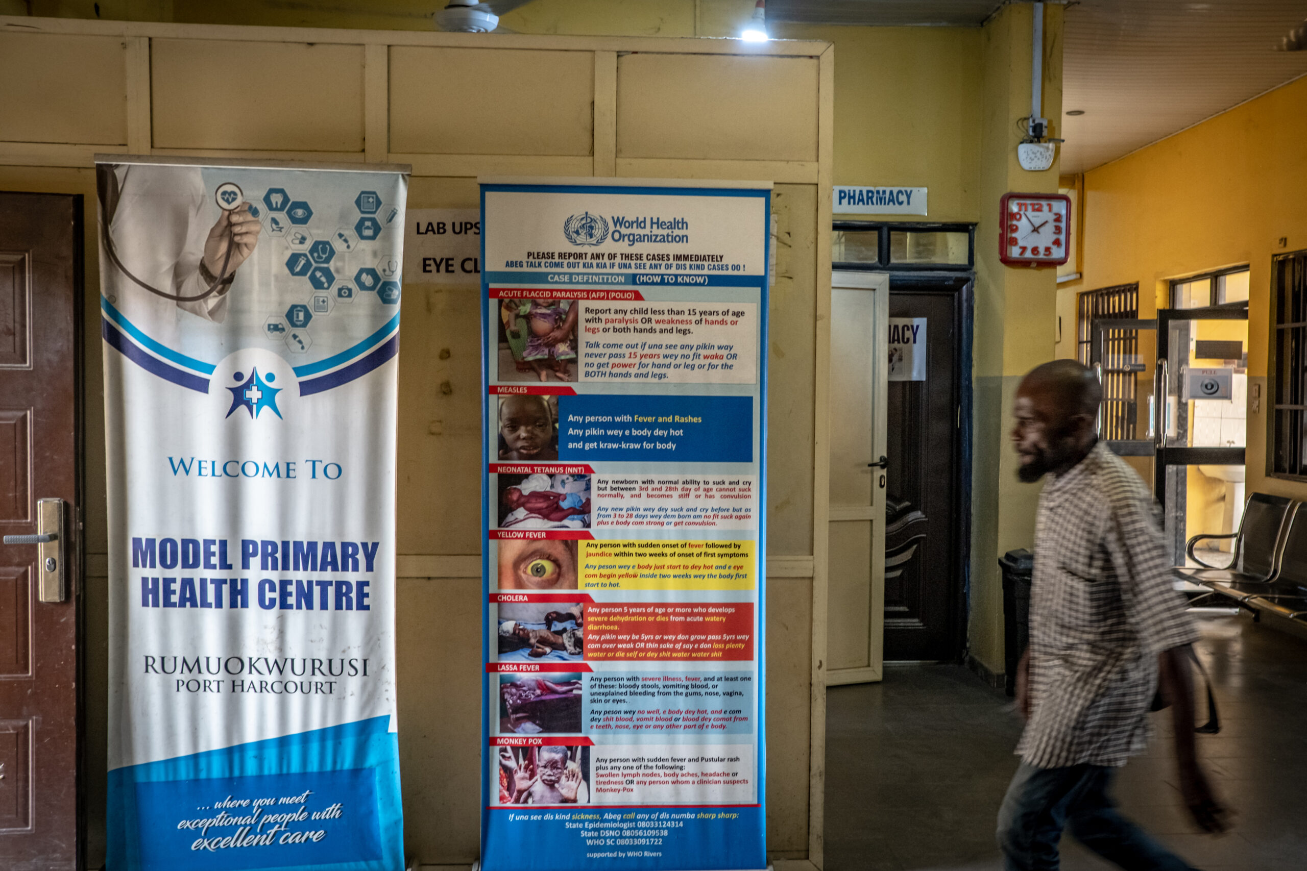 Case-description banners inside the Rumuokwurusi Model Primary Health Care Centre, Port Harcourt