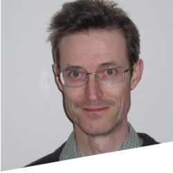 A headshot of Dr Andrew Riordan.