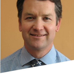 A headshot of Professor Paul Heath.