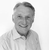 A headshot of Tim Lloyd.