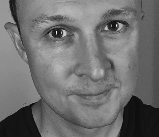 A headshot of Vinny Smith.