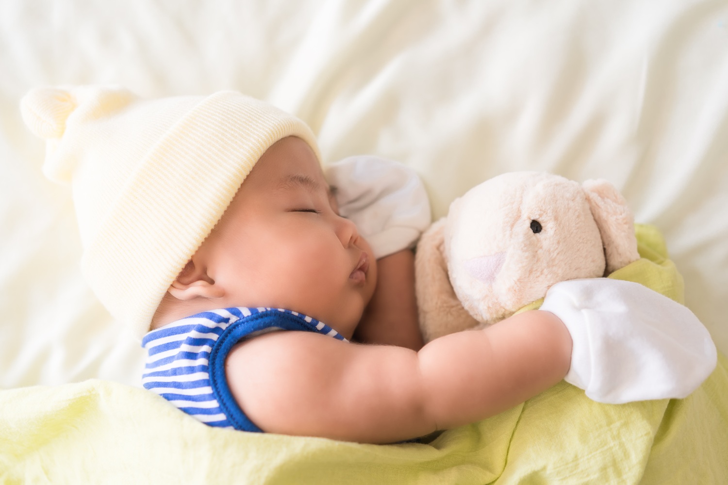 A photograph of a sleeping baby.