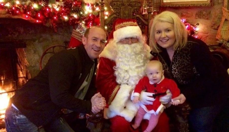 Naomi Bailie and her young family with father Christmas